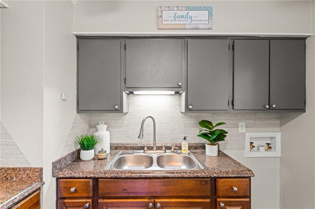 1704 Cedrow Drive High Point, NC 27260 - Photo 11 of 26 Double sinks - Washer hook up to the right of the sink