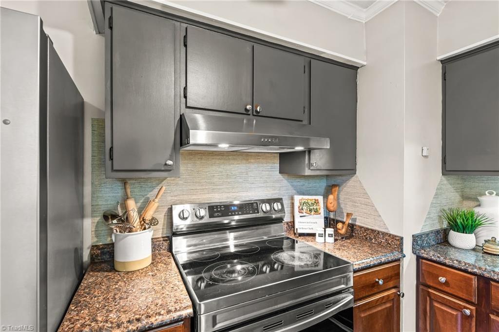 1704 Cedrow Drive High Point, NC 27260 - Photo 10 of 26 Stove and vent hood