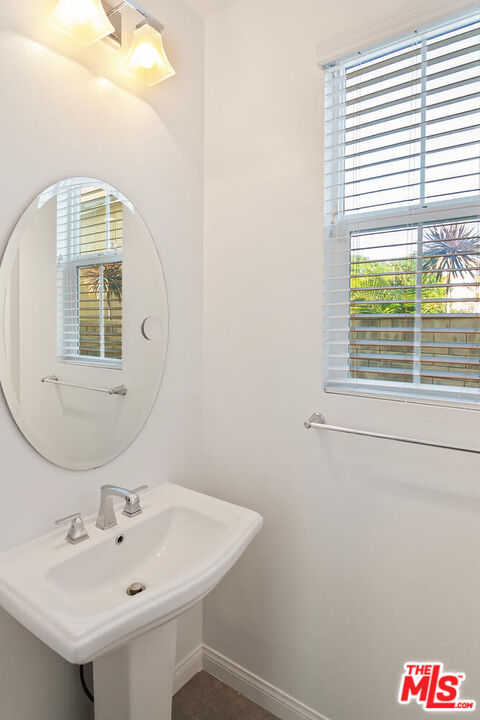 291 Santa Susana Road Camarillo, CA 93010 - Photo 11 of 32 a bathroom with a sink and a mirror