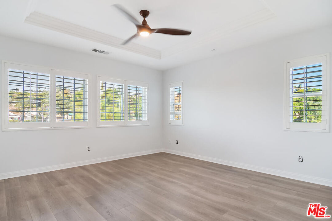 291 Santa Susana Road Camarillo, CA 93010 - Photo 16 of 32 wooden floor in an empty room with a window
