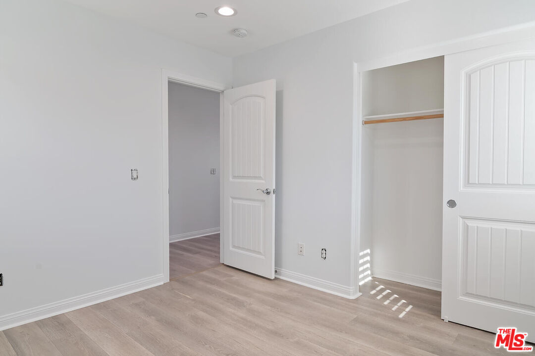 291 Santa Susana Road Camarillo, CA 93010 - Photo 19 of 32 an empty room with wooden floor