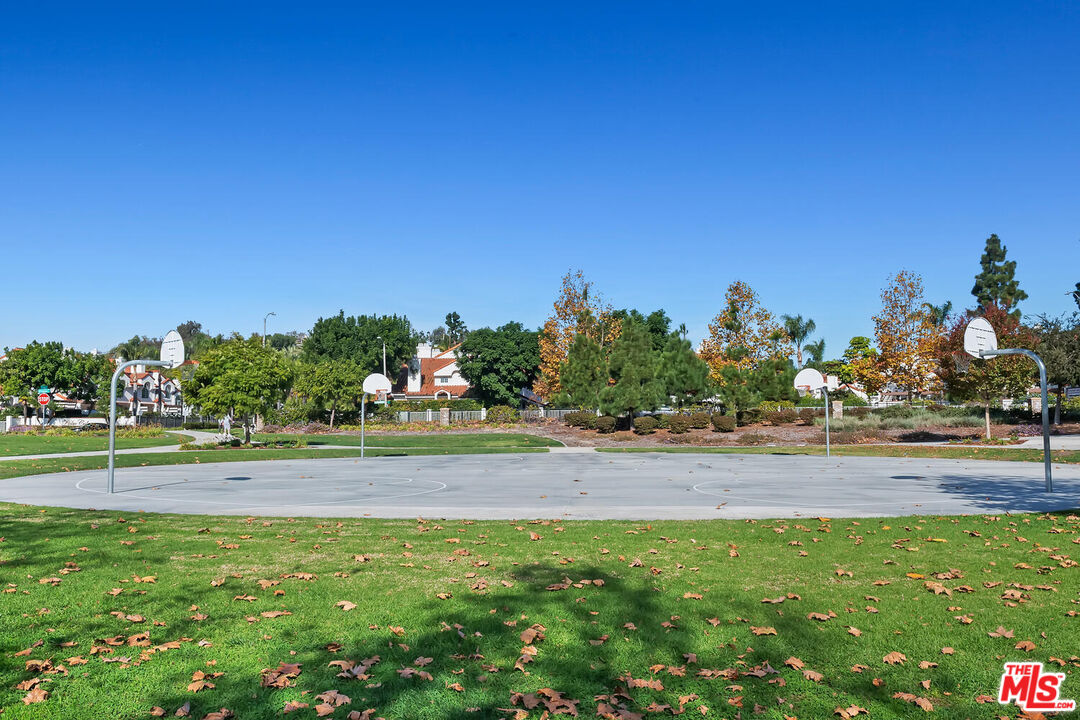 291 Santa Susana Road Camarillo, CA 93010 - Photo 28 of 32 a view of a swimming pool and trees in the background