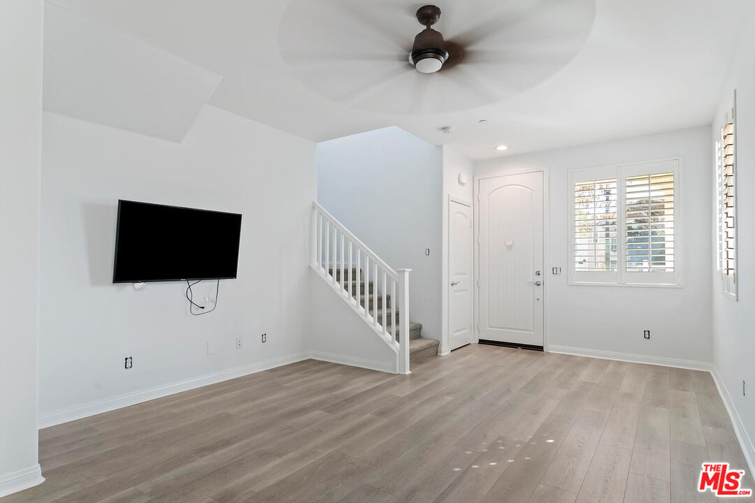 291 Santa Susana Road Camarillo, CA 93010 - Photo 3 of 32 wooden floor in an empty room with a window