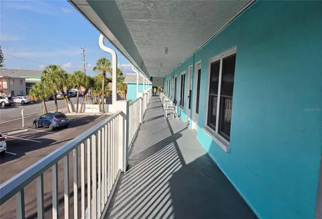 a view of balcony and wooden floor
