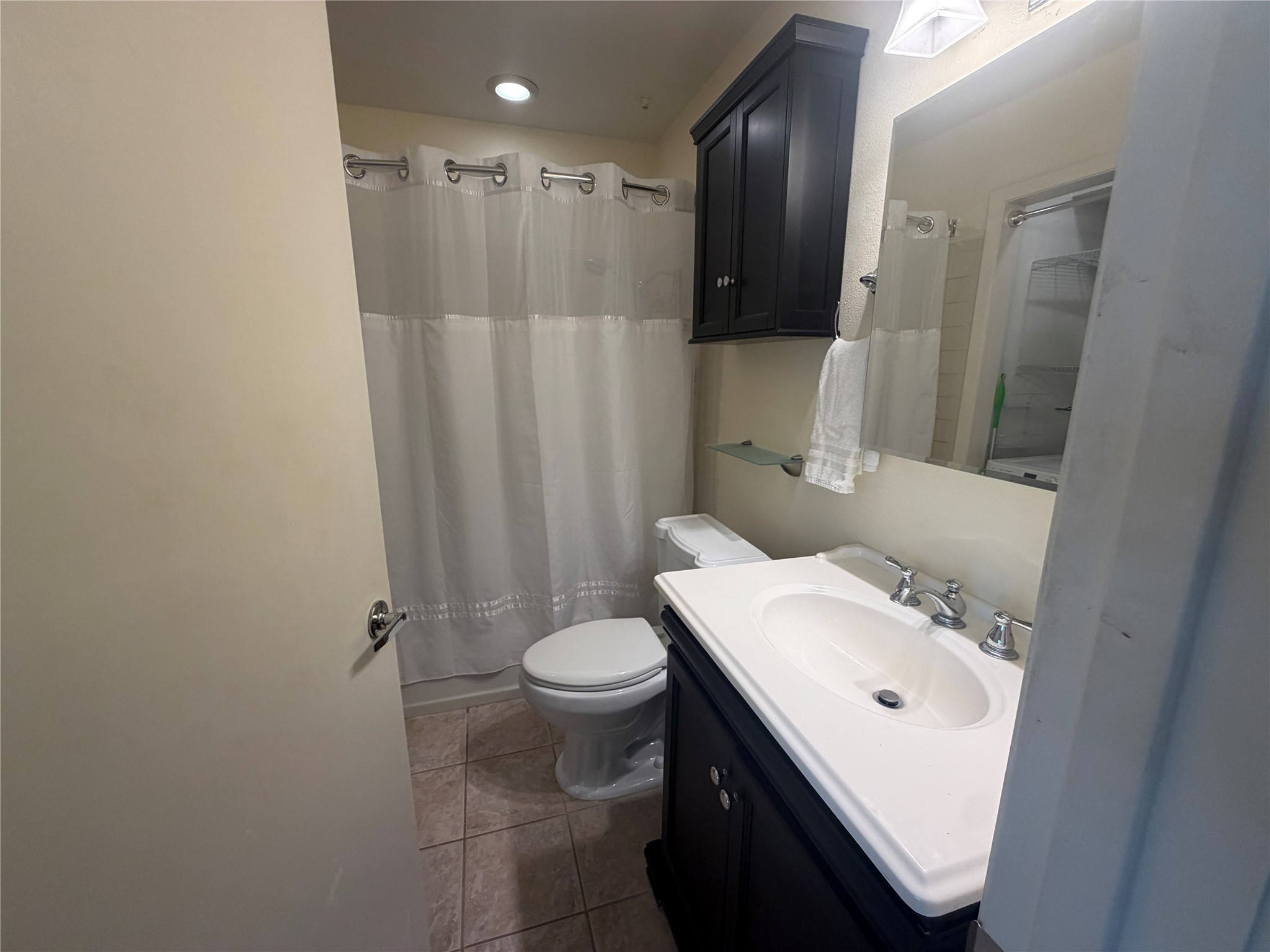 3744 Valley View Road, Unit C Austin, TX 78704 - Photo 19 of 25 a bathroom with a sink toilet and shower