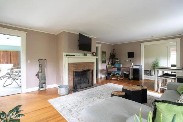 a view of two chairs in the balcony