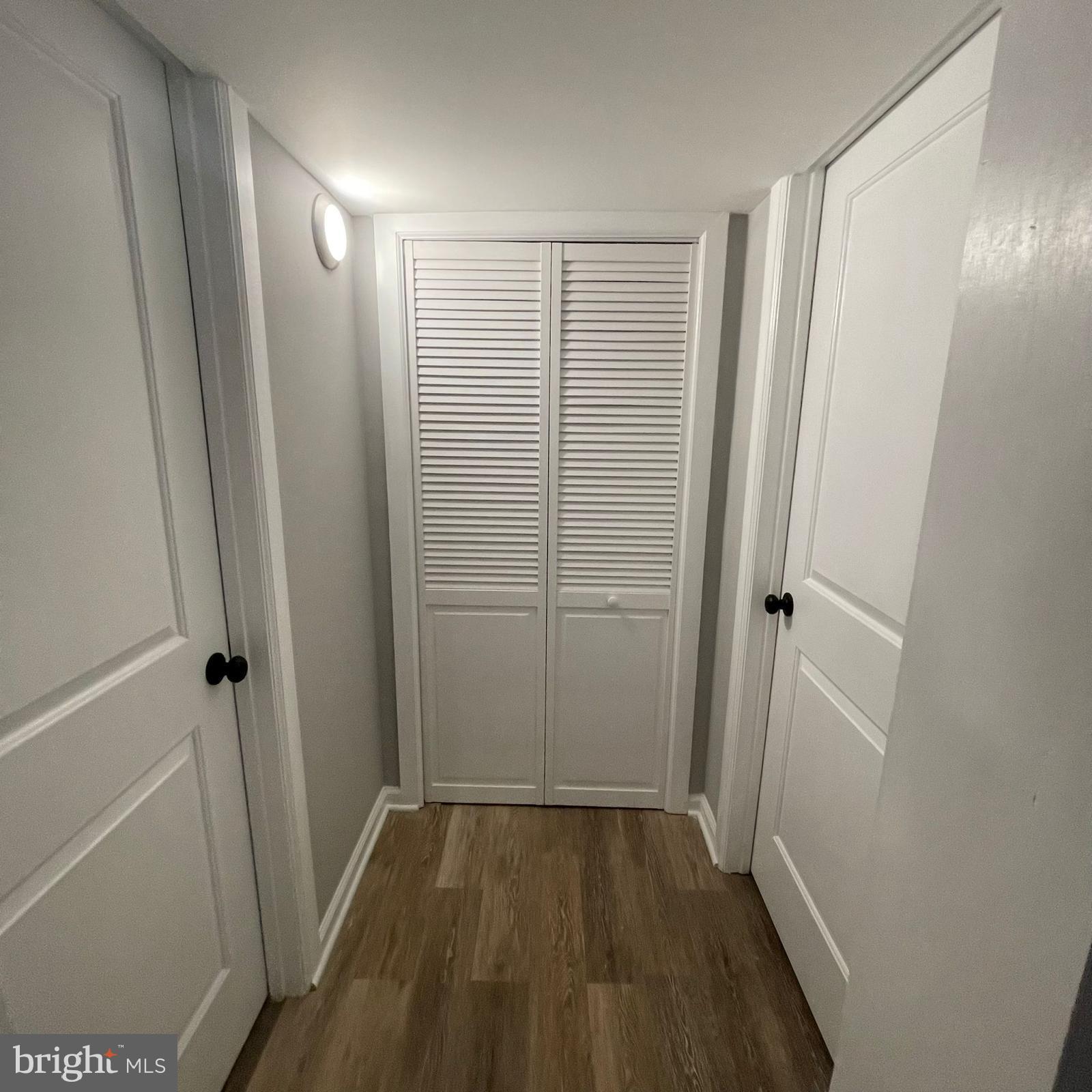 273 56th Place Northeast Washington, DC 20019 - Photo 11 of 25 a view of a bathroom with wooden floor and a sink
