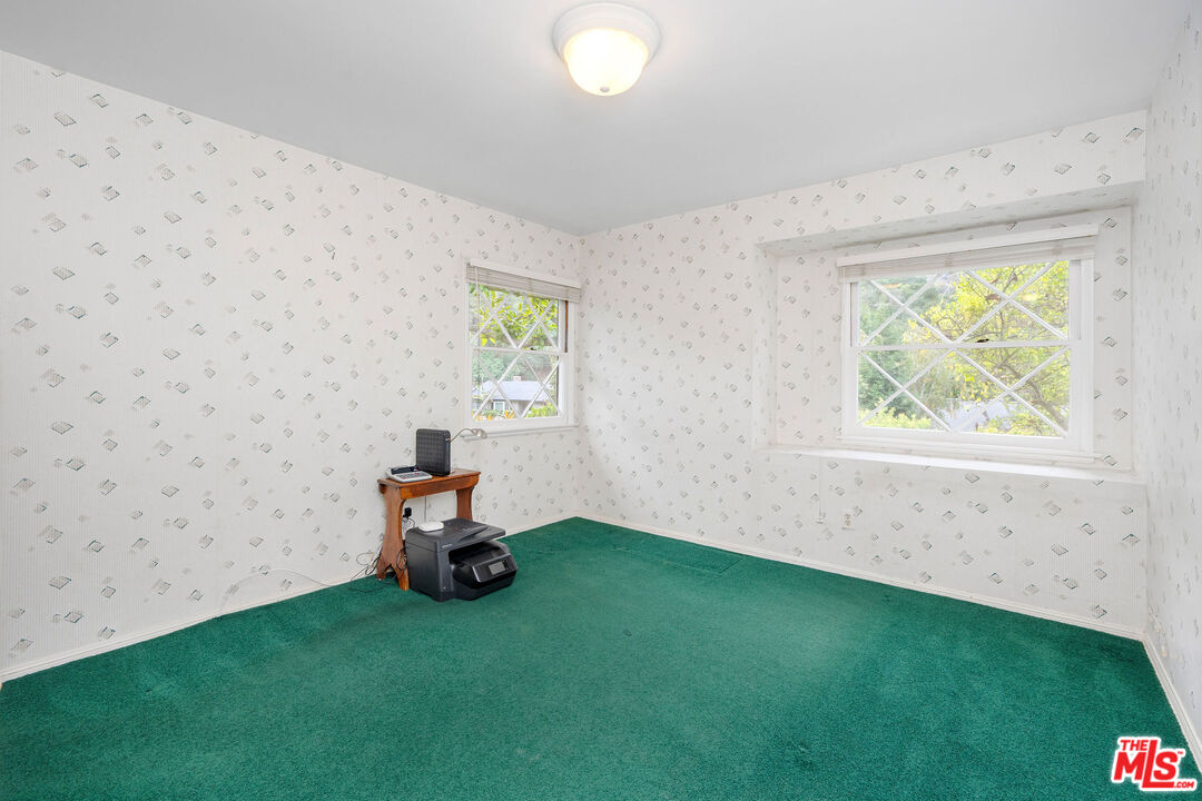 3520 Longridge Avenue Sherman Oaks, CA 91423 - Photo 18 of 37 a small garden with a window