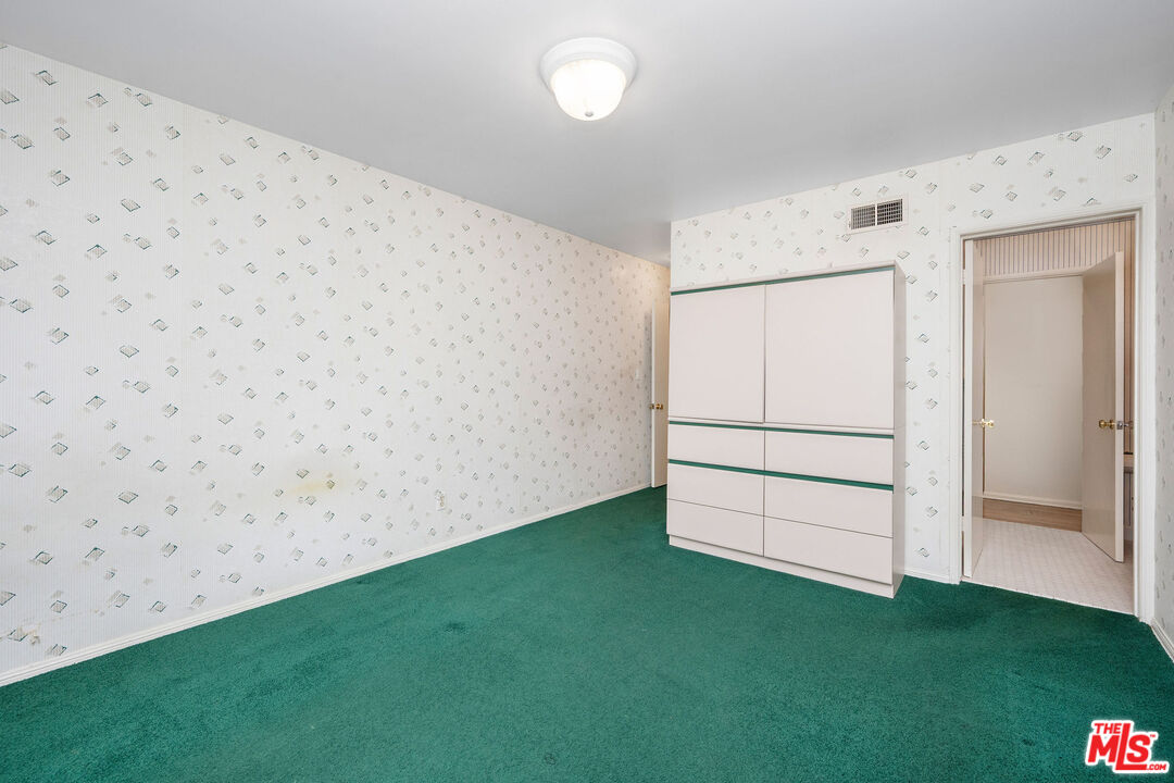 3520 Longridge Avenue Sherman Oaks, CA 91423 - Photo 19 of 37 a view of an empty room with closet