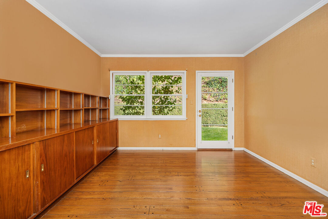 3520 Longridge Avenue Sherman Oaks, CA 91423 - Photo 27 of 37 a view of wooden floor and windows in a room