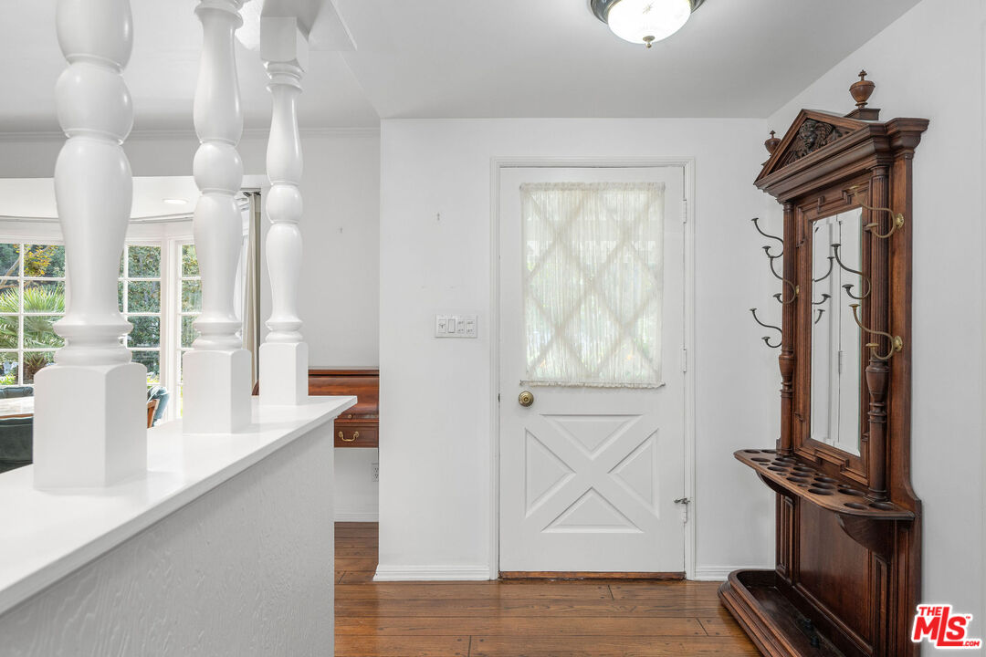 3520 Longridge Avenue Sherman Oaks, CA 91423 - Photo 5 of 37 a view of an entryway with wooden floor