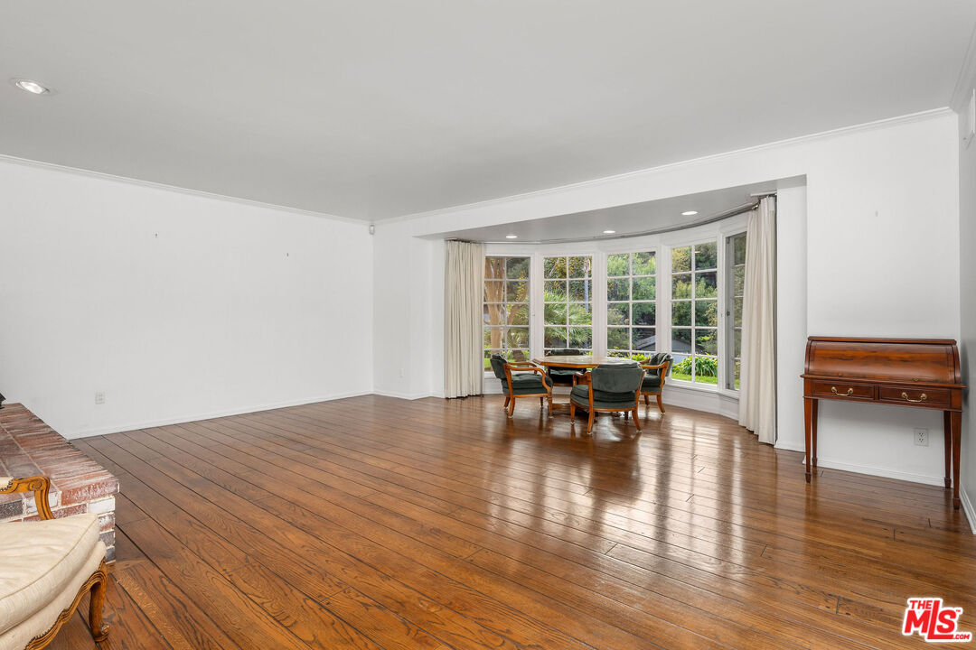3520 Longridge Avenue Sherman Oaks, CA 91423 - Photo 7 of 37 a view of dining room with furniture and wooden floor