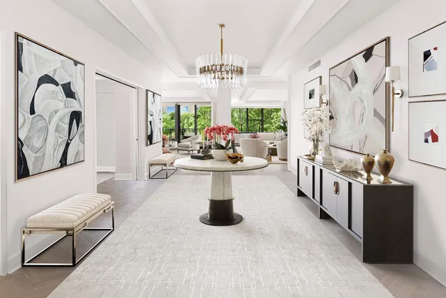 a large bedroom with a bed and a window