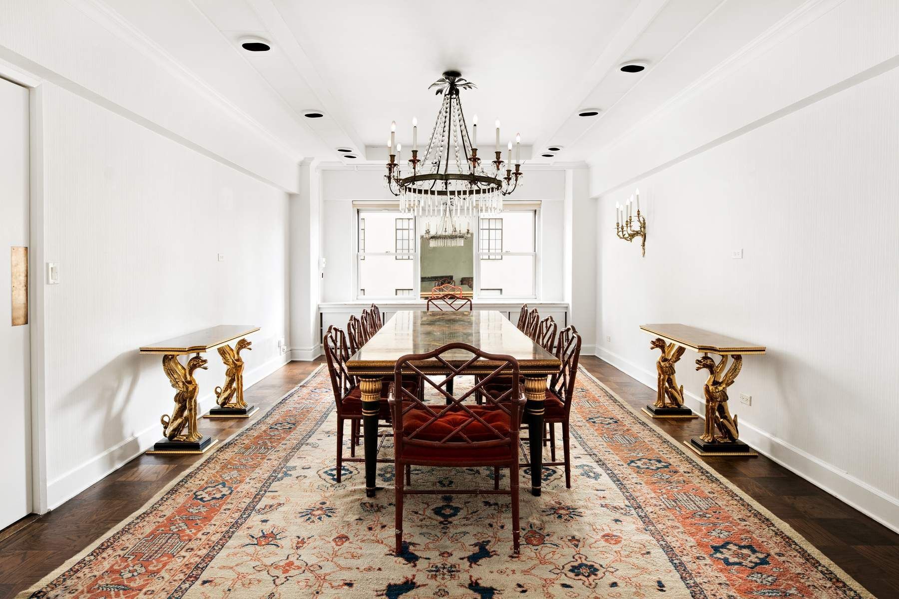 857 5th Avenue, Unit 7 Manhattan, NY 10065 - Photo 19 of 22 a view of a dining room with furniture window and wooden floor