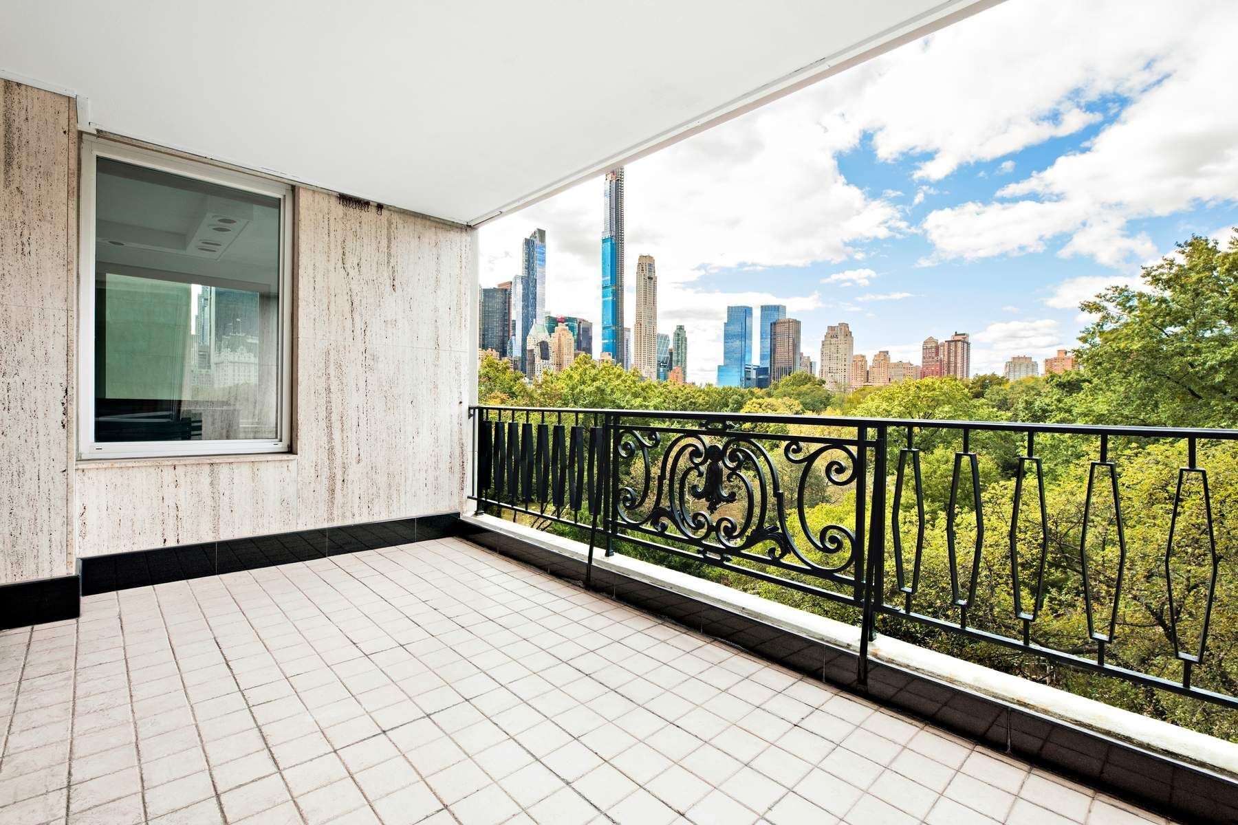 857 5th Avenue, Unit 7 Manhattan, NY 10065 - Photo 2 of 22 a view of a balcony with city view