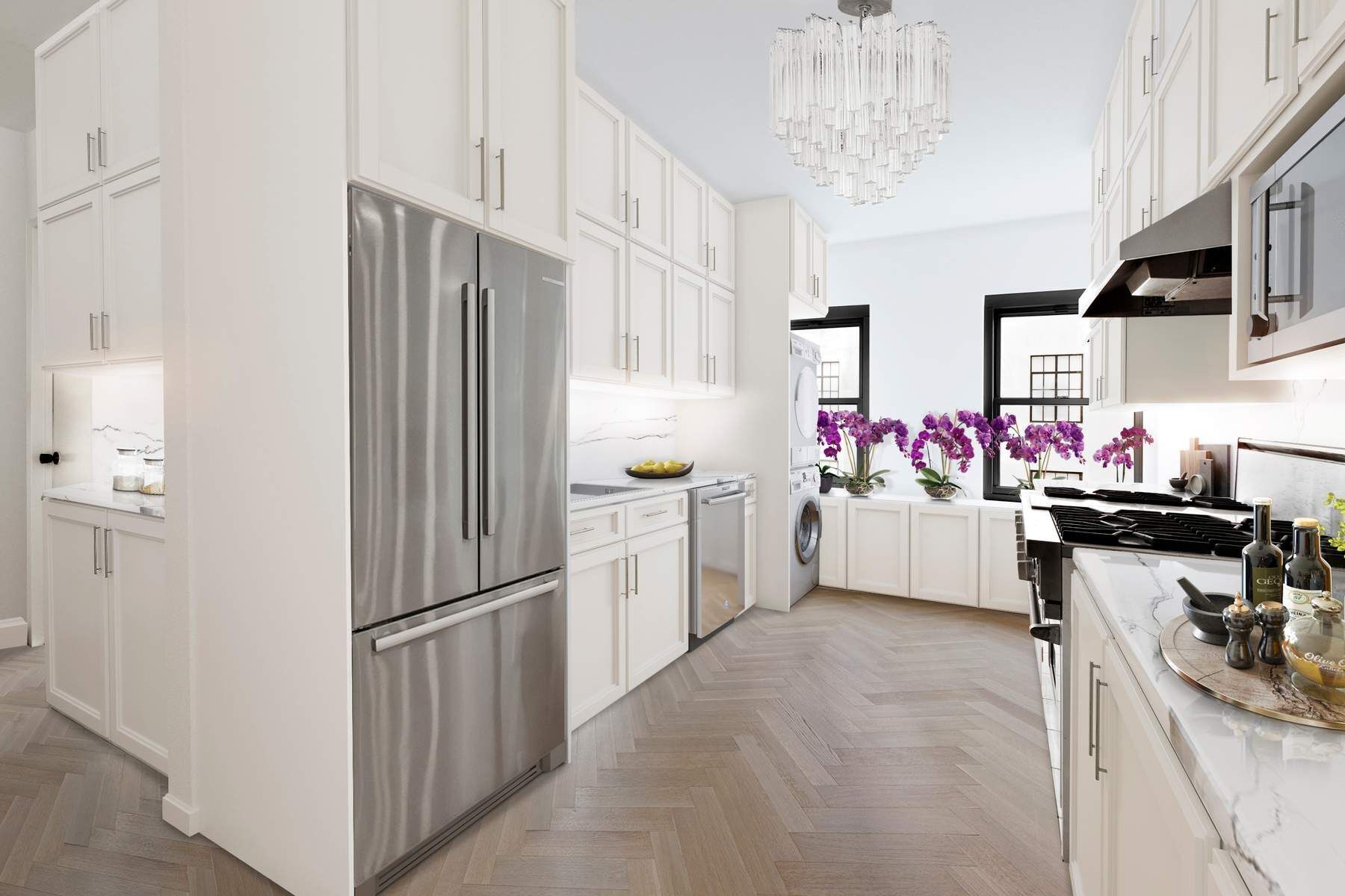 857 5th Avenue, Unit 7 Manhattan, NY 10065 - Photo 20 of 22 a kitchen that has a lot of white cabinets and stainless steel appliances