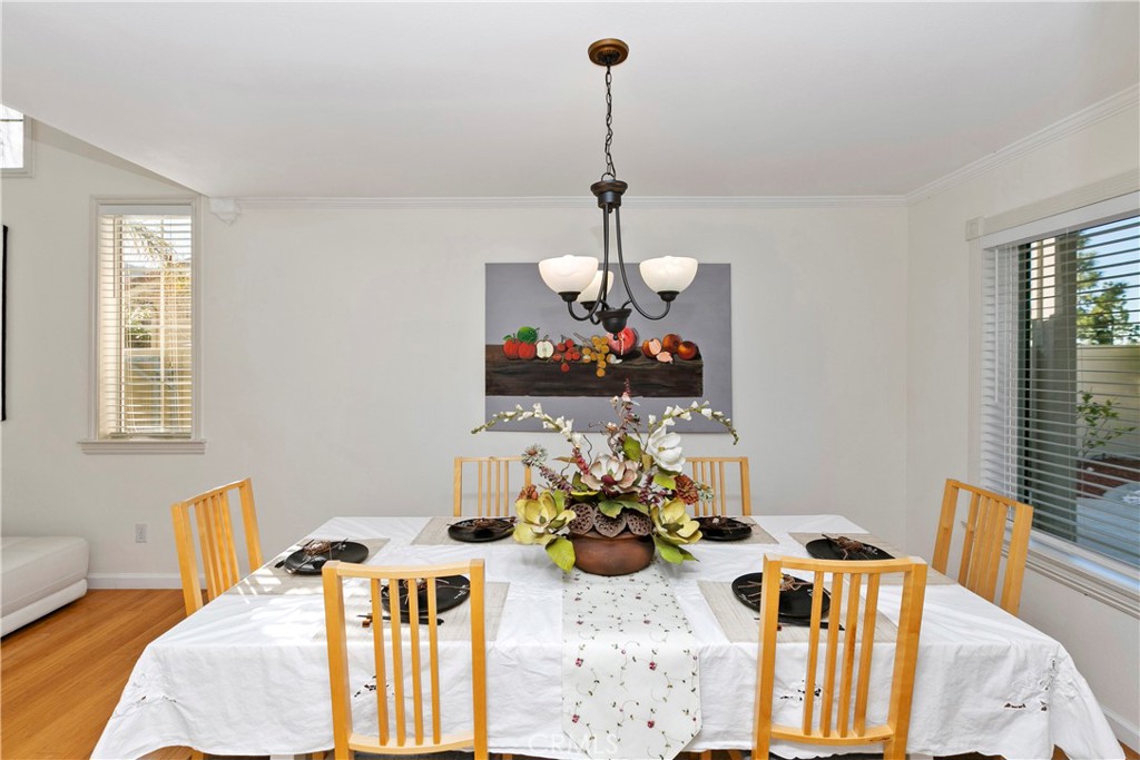 747 Donatello Drive Corona, CA 92882 - Photo 11 of 56 a view of a dining room with furniture