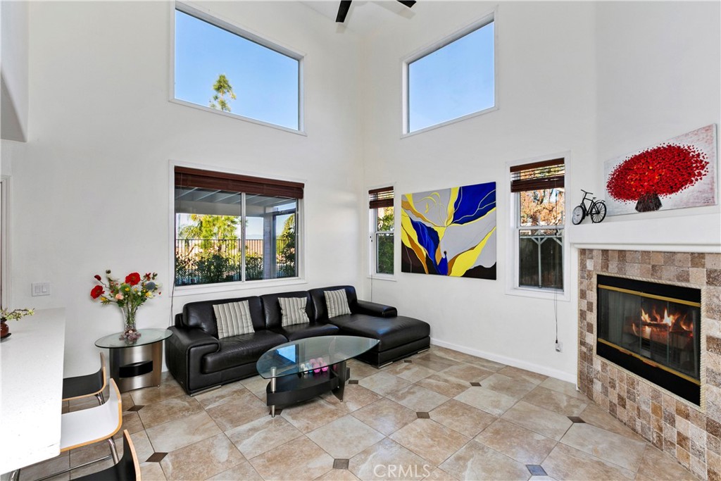 747 Donatello Drive Corona, CA 92882 - Photo 17 of 56 a living room with furniture and a fireplace