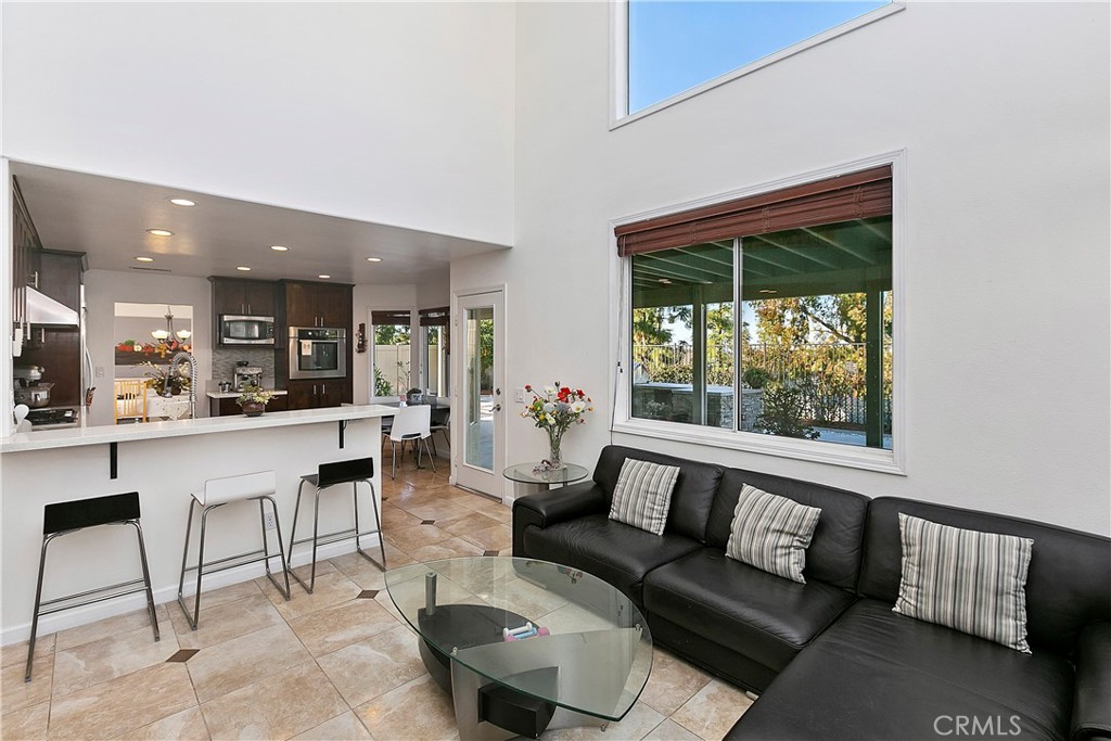 747 Donatello Drive Corona, CA 92882 - Photo 18 of 56 a living room with furniture and a large window