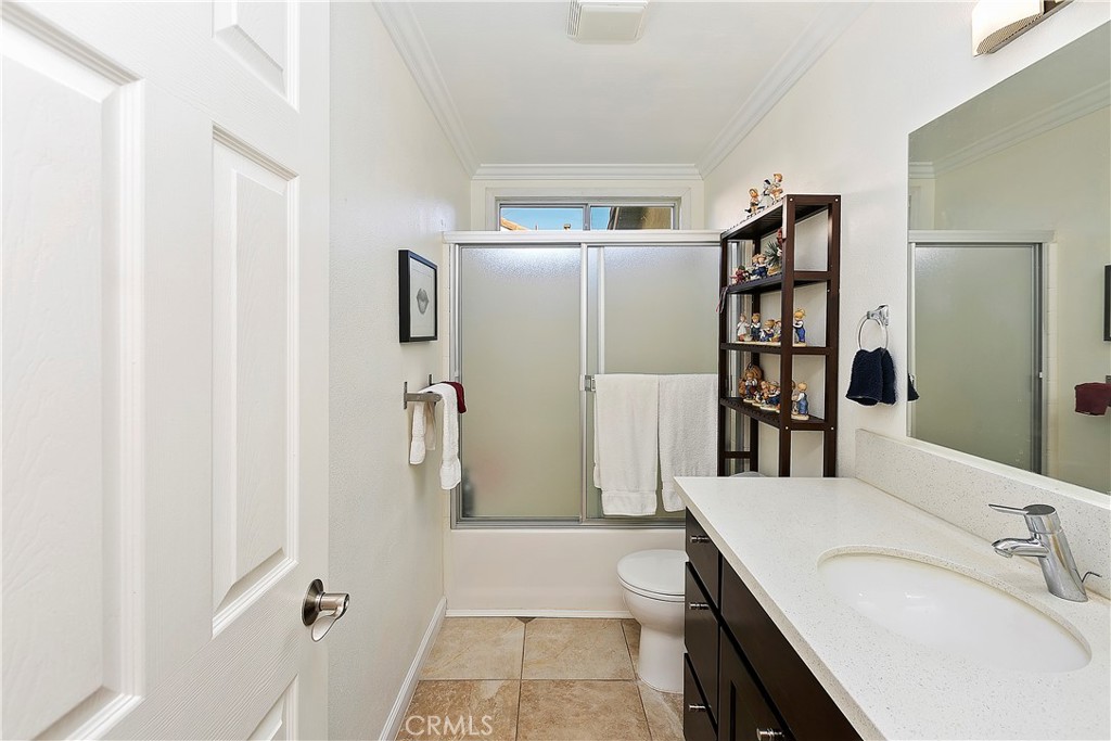 747 Donatello Drive Corona, CA 92882 - Photo 22 of 56 a bathroom with a bathtub sink and toilet