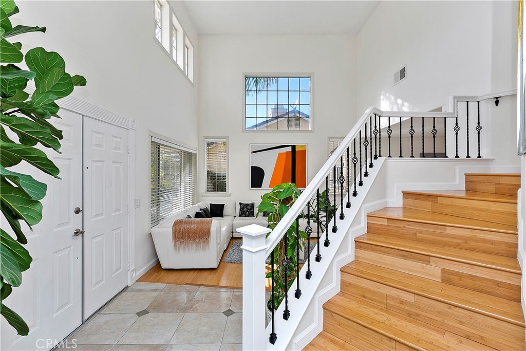 747 Donatello Drive Corona, CA 92882 - Photo 24 of 56 a view of entryway and hall with wooden floor