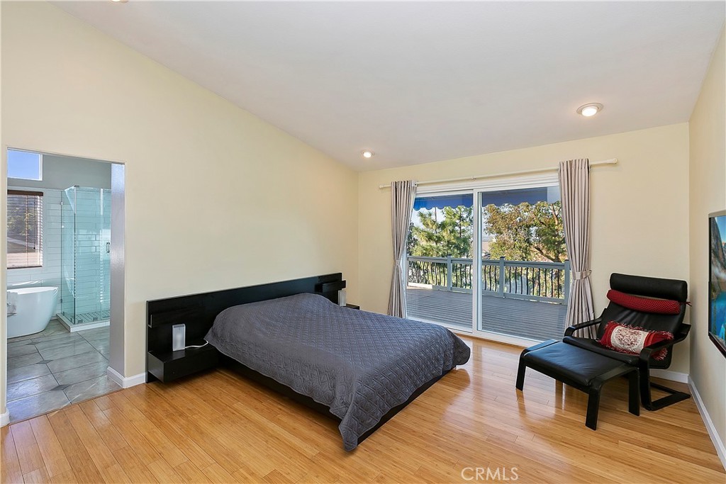 747 Donatello Drive Corona, CA 92882 - Photo 28 of 56 a bedroom with a bed and a window