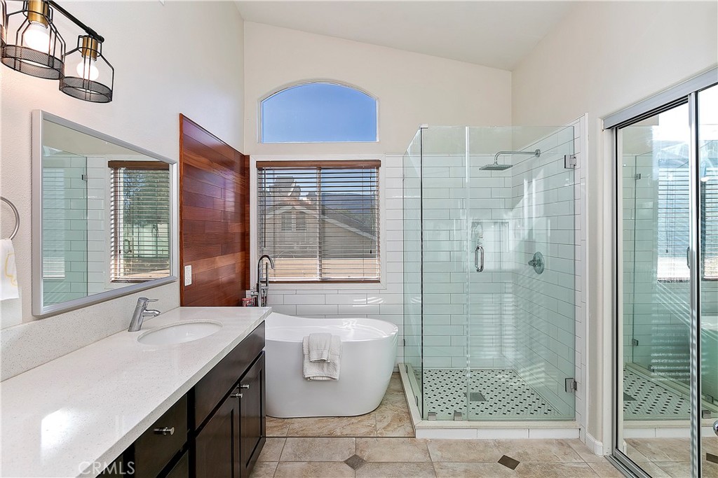 747 Donatello Drive Corona, CA 92882 - Photo 32 of 56 a bathroom with a sink a toilet and shower