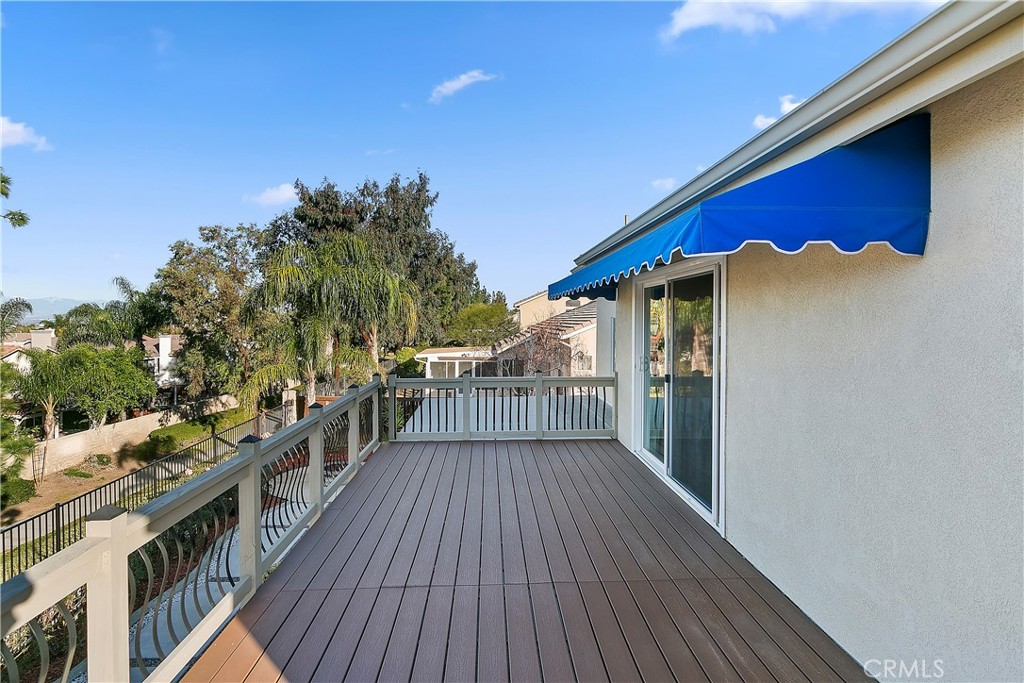747 Donatello Drive Corona, CA 92882 - Photo 37 of 56 a view of a balcony with wooden floor