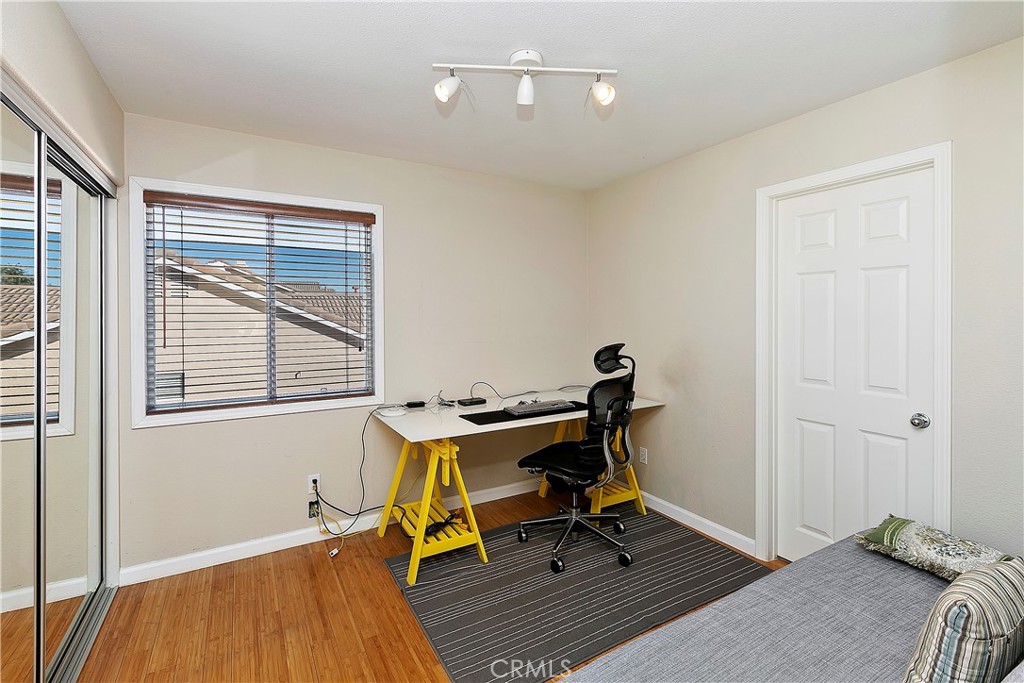 747 Donatello Drive Corona, CA 92882 - Photo 39 of 56 a view of a workspace with furniture and a window