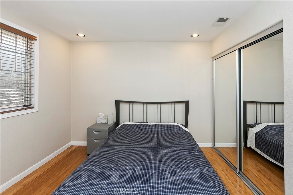 747 Donatello Drive Corona, CA 92882 - Photo 40 of 56 a bed room with a bed and a window