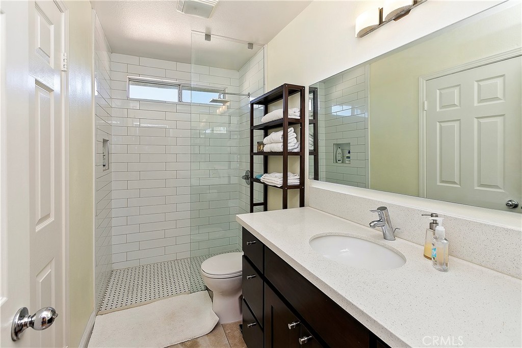 747 Donatello Drive Corona, CA 92882 - Photo 41 of 56 a bathroom with a sink toilet and shower