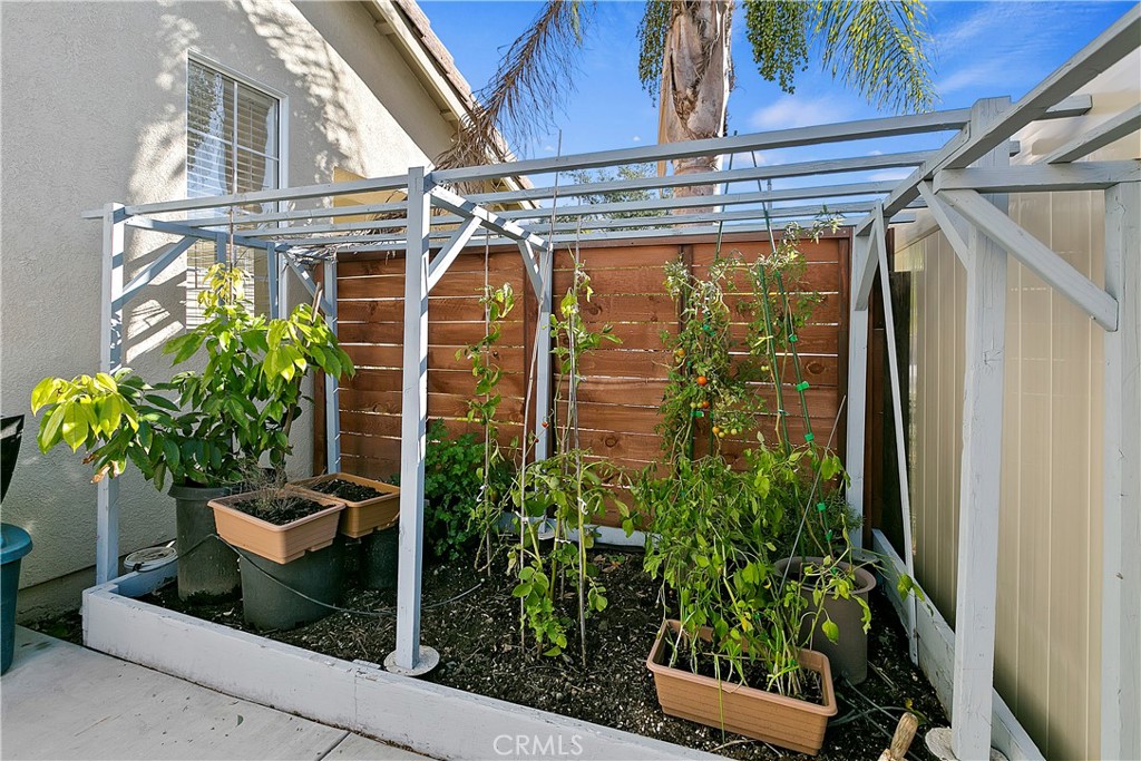 747 Donatello Drive Corona, CA 92882 - Photo 52 of 56 a view of a porch with potted plants