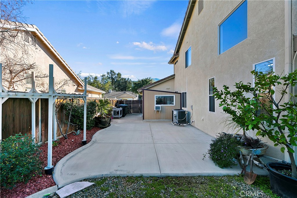 747 Donatello Drive Corona, CA 92882 - Photo 55 of 56 a view of a house with backyard and porch