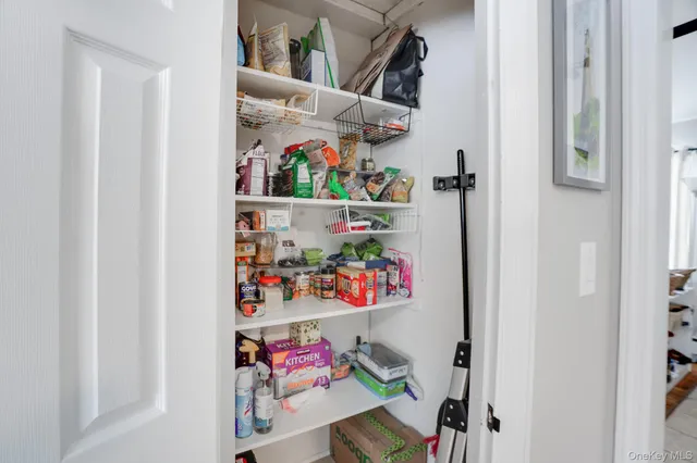 a bedroom with bed and a window
