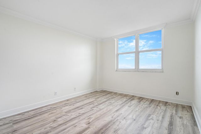 a kitchen with a refrigerator and washer