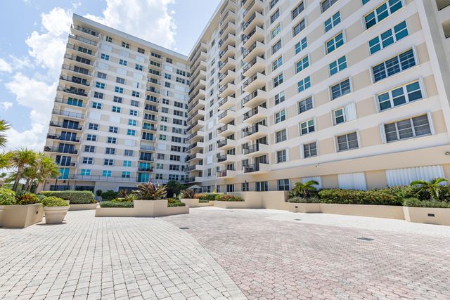 a view of a lake with a yard