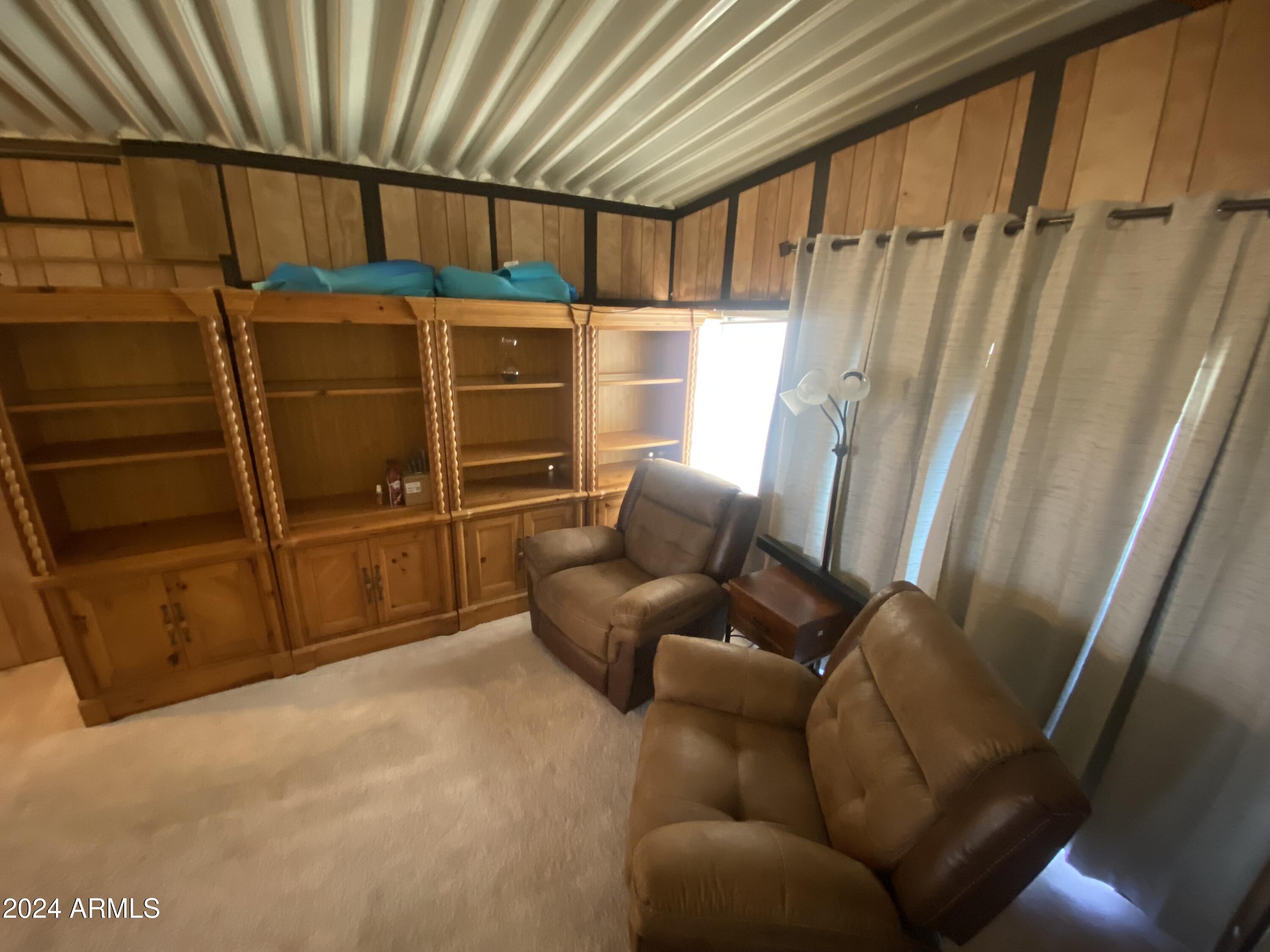 2323 South Pomo Avenue Apache Junction, AZ 85119 - Photo 17 of 42 a view of living room with furniture and a window
