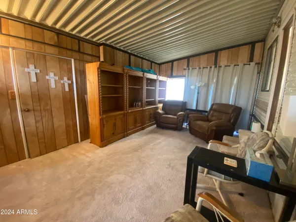 a room with furniture and a window