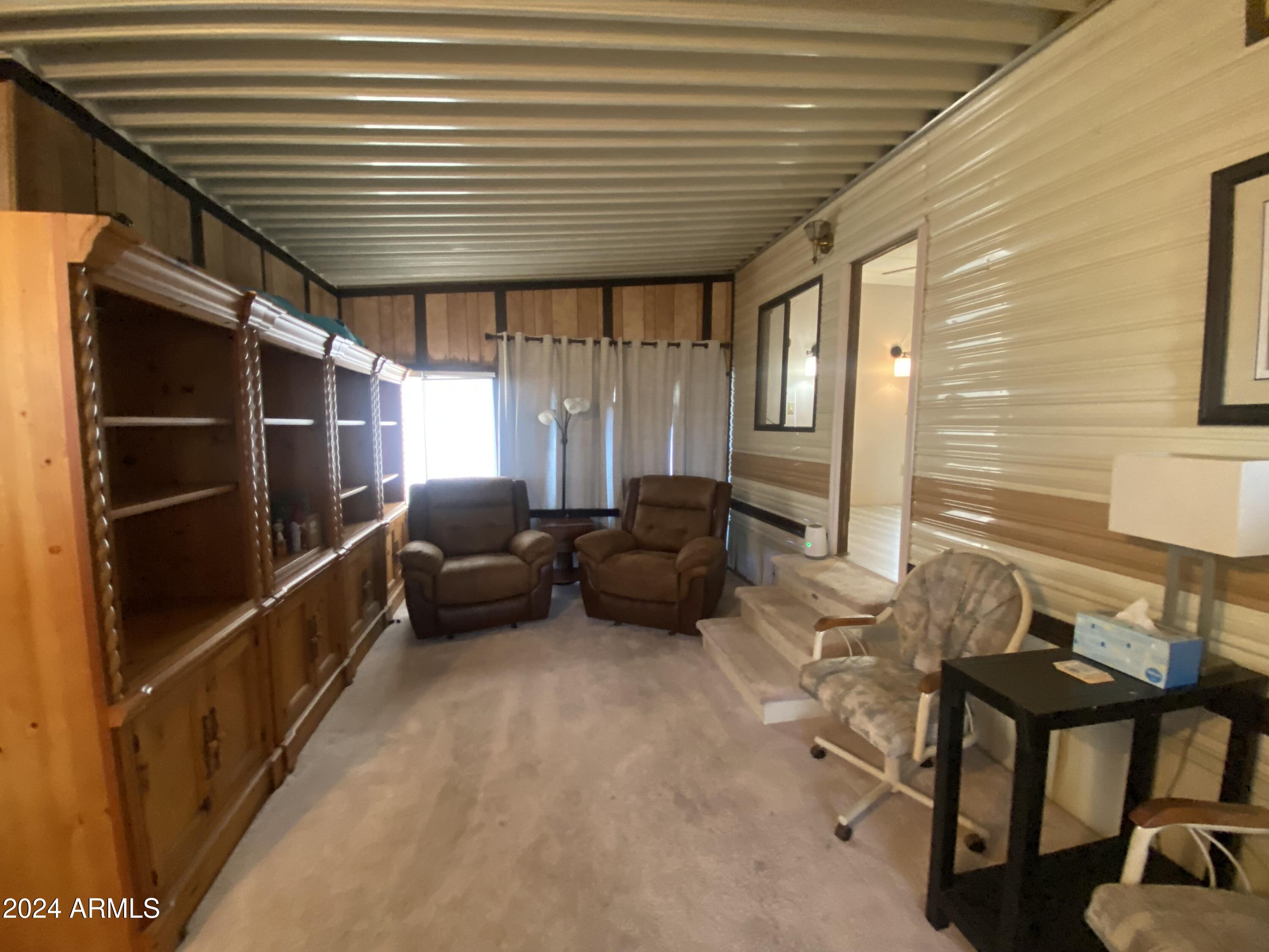 2323 South Pomo Avenue Apache Junction, AZ 85119 - Photo 19 of 42 a living room with furniture