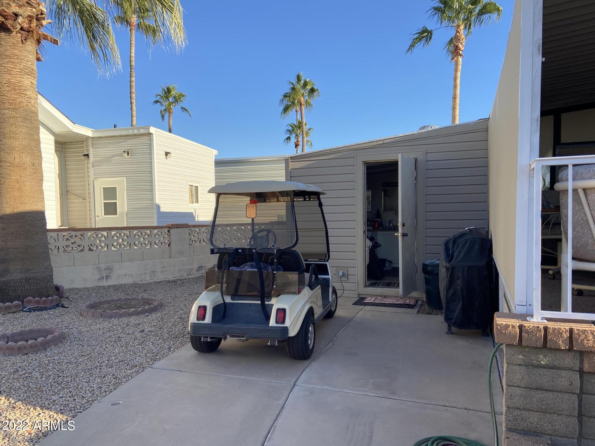 2323 South Pomo Avenue Apache Junction, AZ 85119 - Photo 34 of 42 a view of car parked in front of house