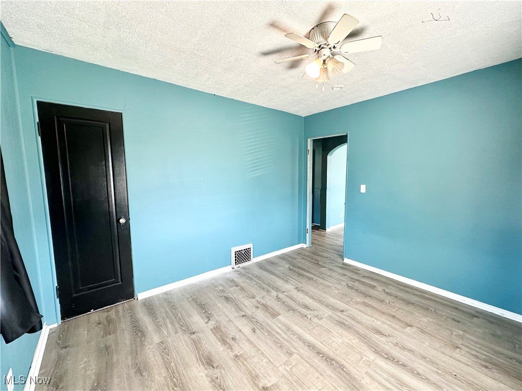 87 R 26th Street Wellsburg, WV 26070 - Photo 9 of 17 Bedroom featuring a ceiling fan