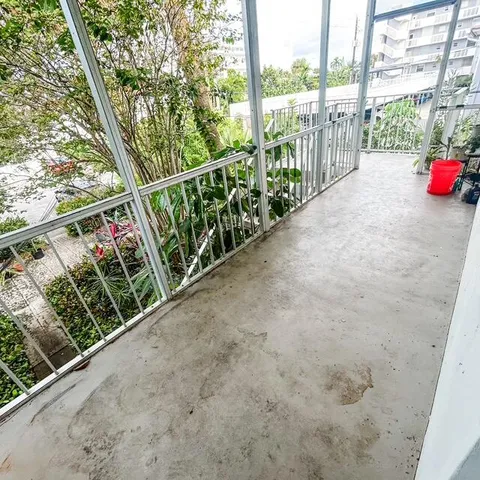 a view of a balcony with city view