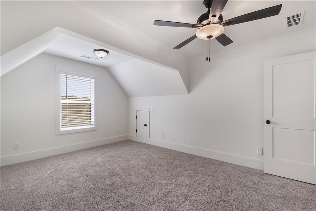 2113 Stonegate Way Monroe, GA 30656 - Photo 35 of 43 a view of an empty room with a window
