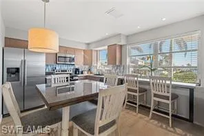 a view of a dining room with furniture