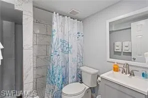 a bedroom with bed and a window