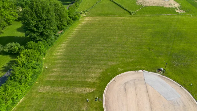 a view of a golf course with a garden