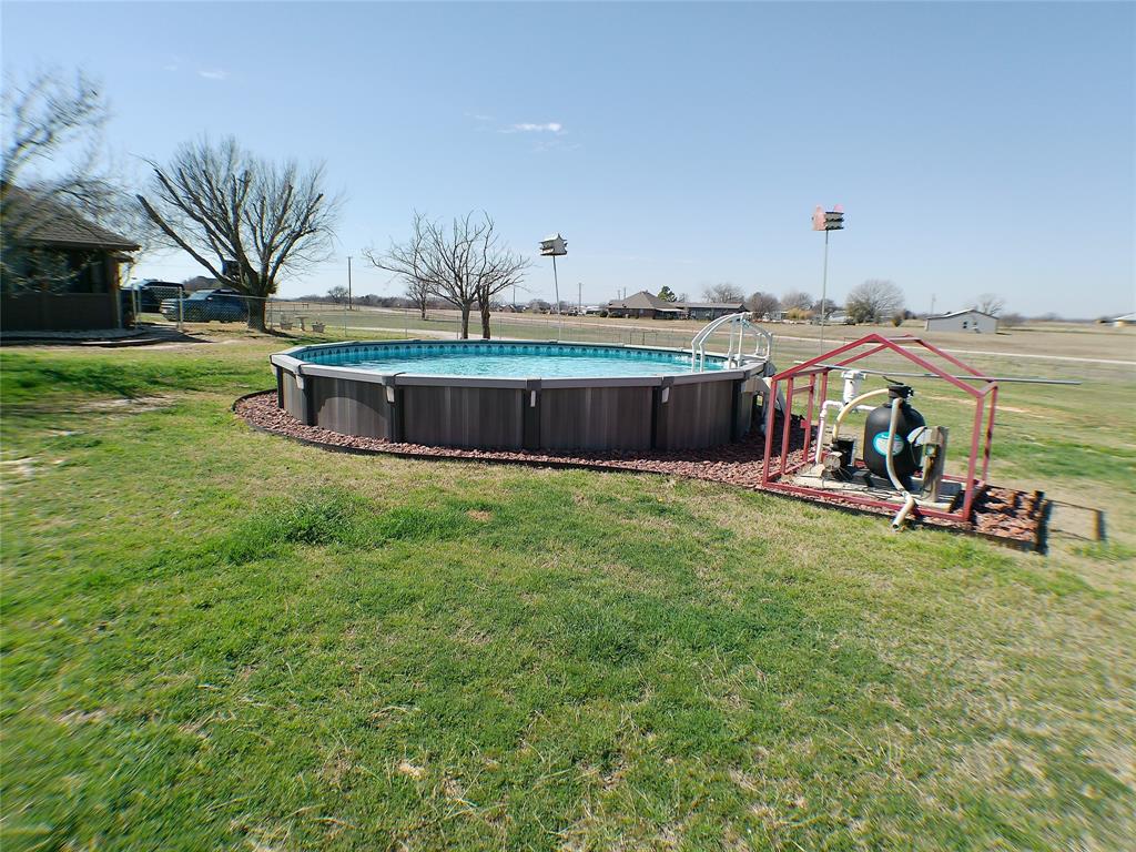 200 County Road 3170 Decatur, TX 76234 - Photo 14 of 31 a view of a house with a yard and sitting area