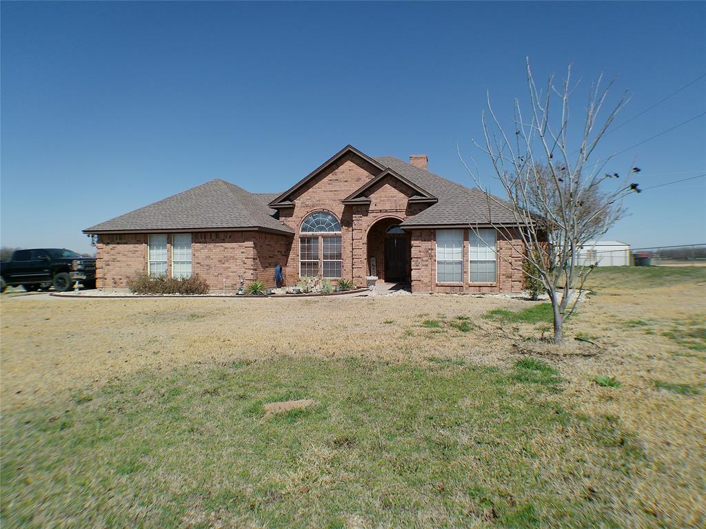 200 County Road 3170 Decatur, TX 76234 - Photo 2 of 31 a front view of a house with a yard