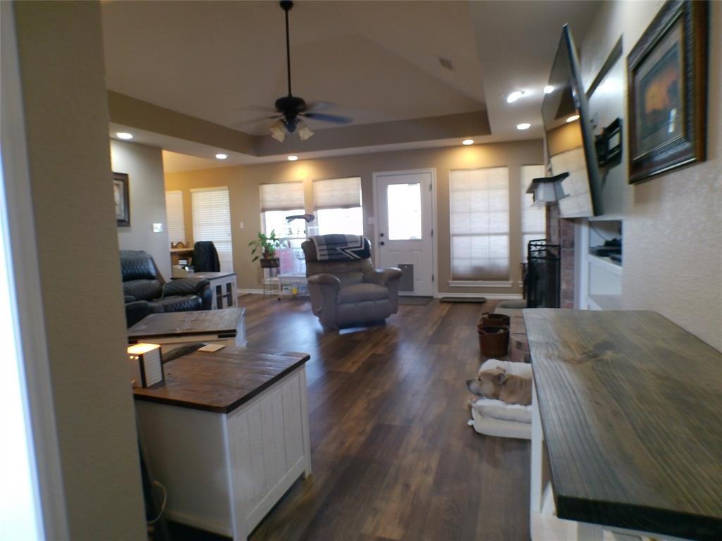 200 County Road 3170 Decatur, TX 76234 - Photo 5 of 31 a living room with furniture fireplace and a flat screen tv