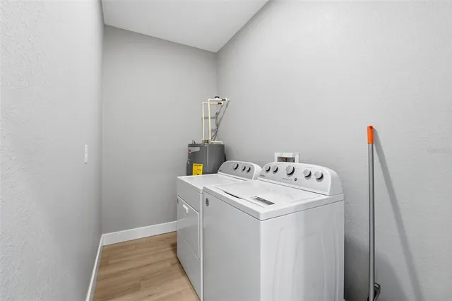 a utility room with dryer and washer
